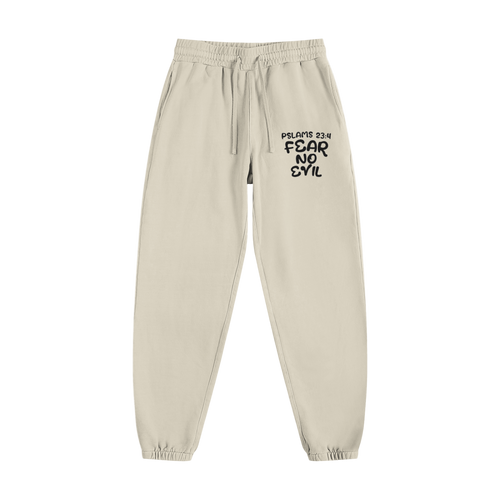 Fear No Evil Sweatpants in light beige with Psalm 23:4 design, elastic waistband, drawstring, side pockets, and ribbed cuffs for comfortable casual wear